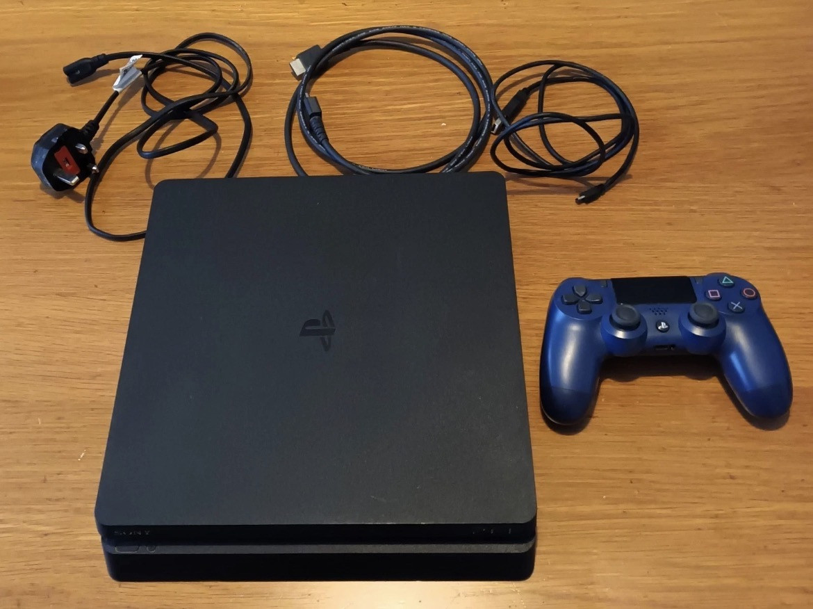 Play Station 4 PS4  Slim 500Gb Console-Black and Two Games.